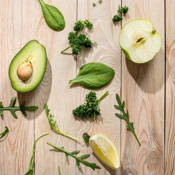 Sliced avocado and greens — Stock Photo, Image
