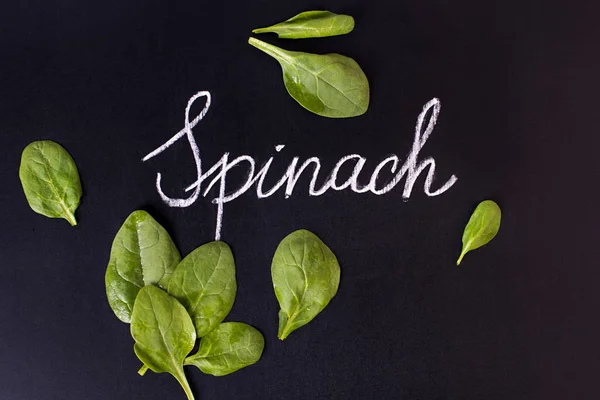 Spinach leaves and lettering — Stock Photo, Image