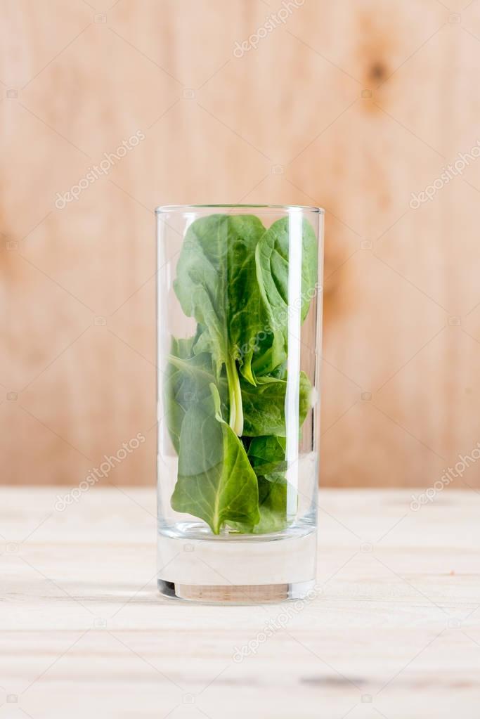 spinach leaves in glass 