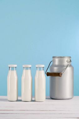 glass bottles of milk with can clipart