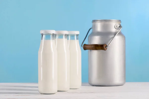 Milk in glass bottles — Stock Photo, Image