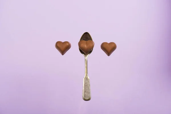 Doces de chocolate em forma de coração — Fotografia de Stock