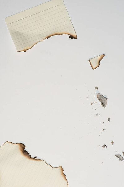 pieces of paper sheet with burned edges