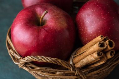 red apples and cinnamon sticks clipart