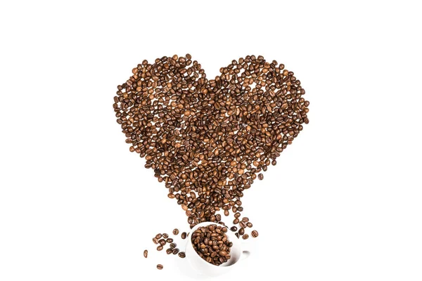 Heart symbol made from coffee seeds — Stock Photo, Image