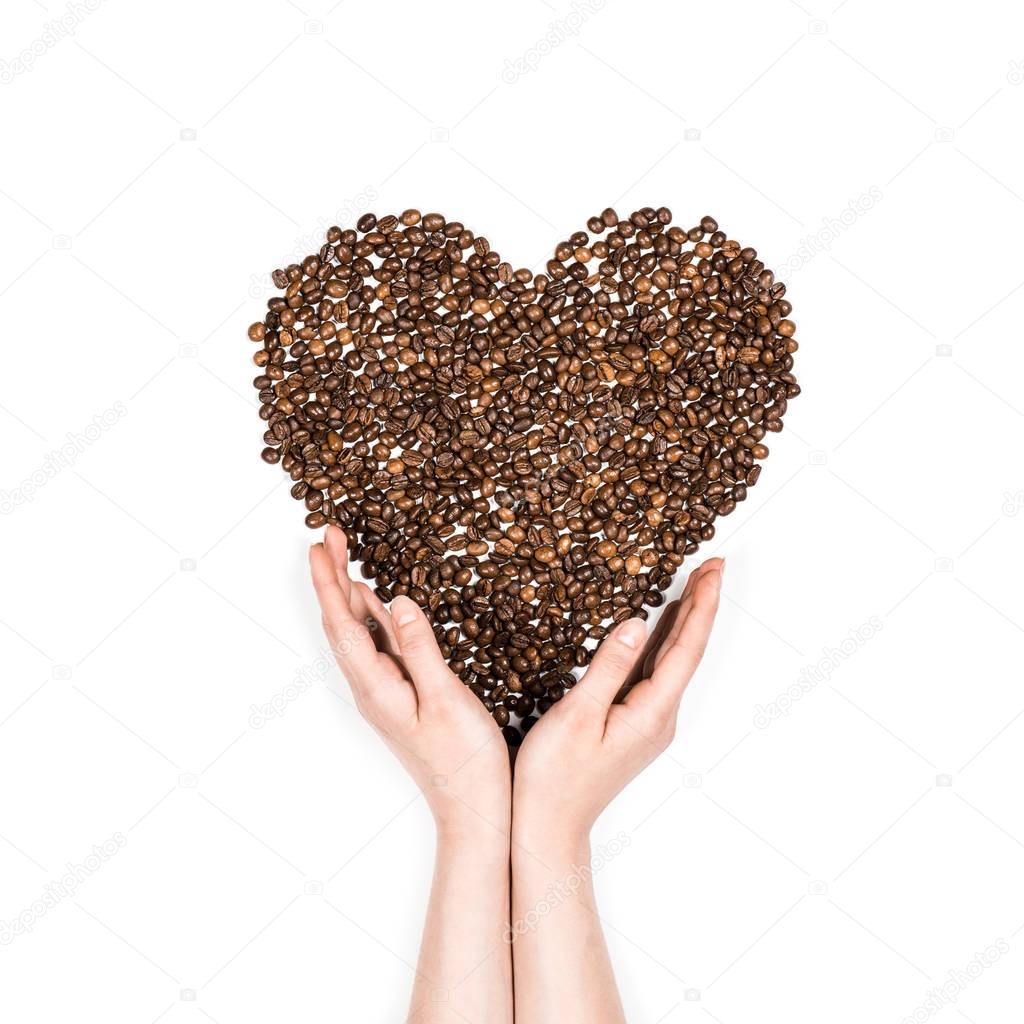 Heart symbol made from coffee seeds