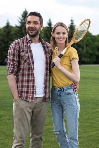 Couple with badminton racquet — Stock Photo, Image