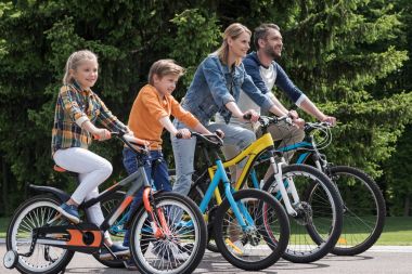 family riding bicycles clipart
