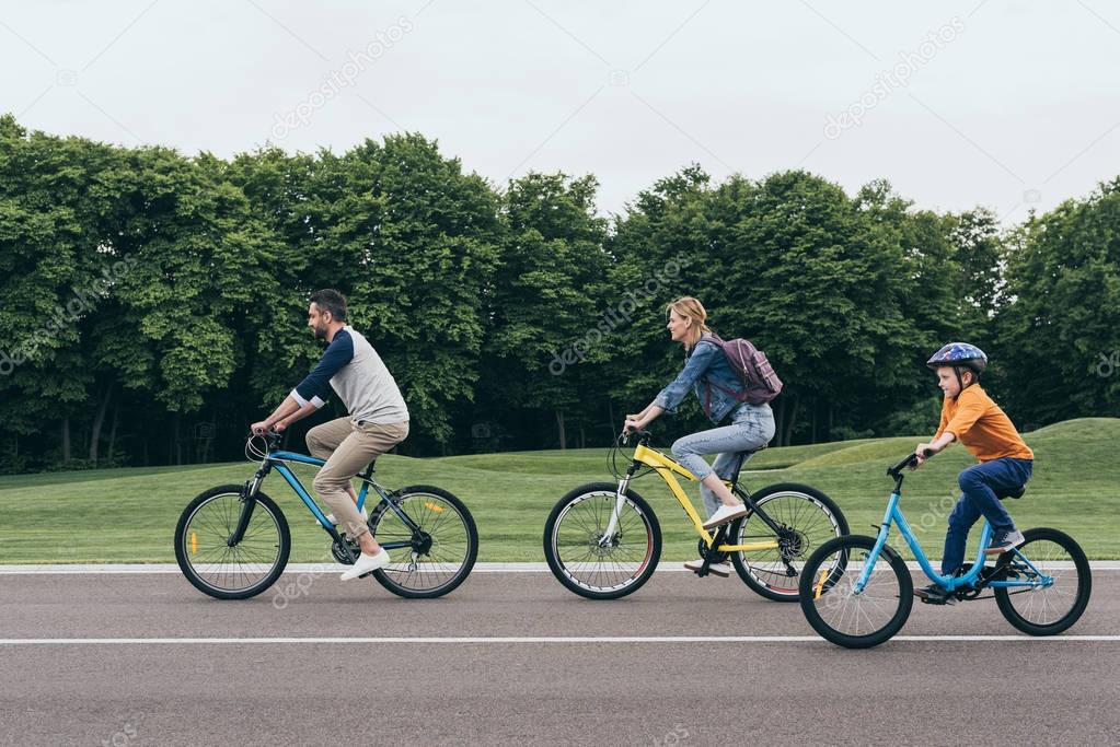 family riding bicycles