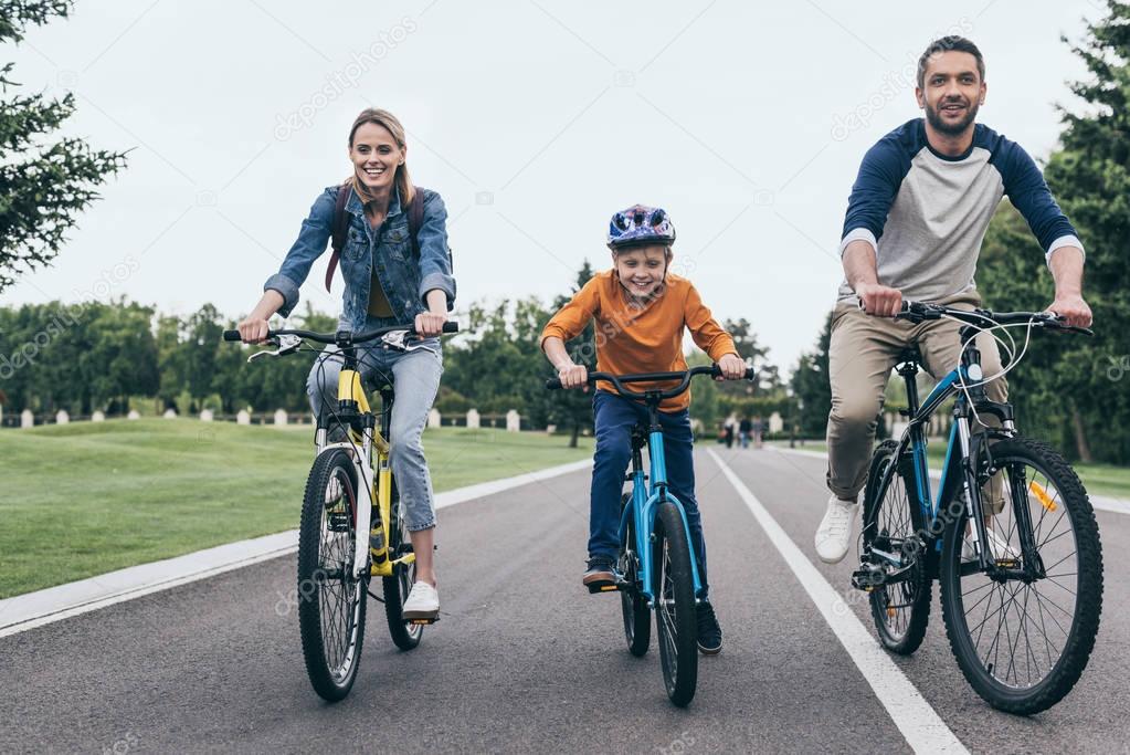 family riding bicycles