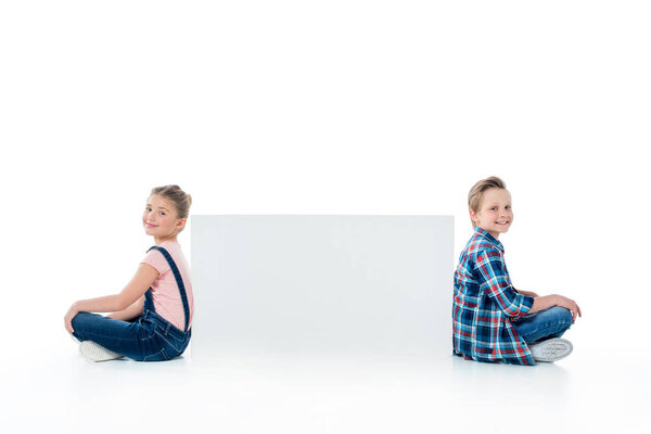 Cute kids with blank banner 