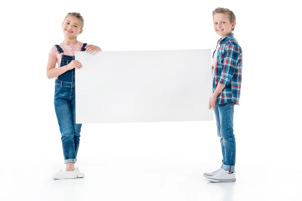 Cute kids with blank banner — Stock Photo, Image