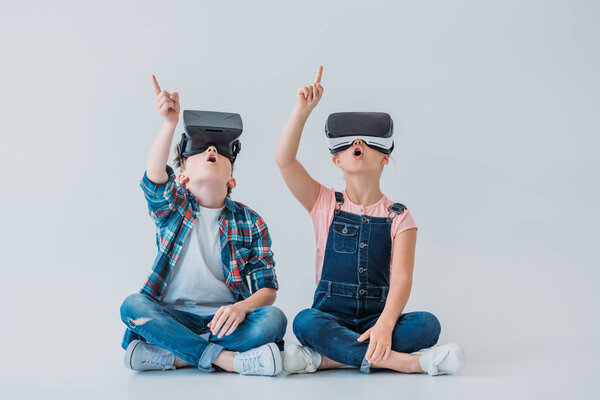 kids using virtual reality headsets