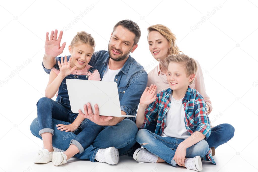 family using laptop  