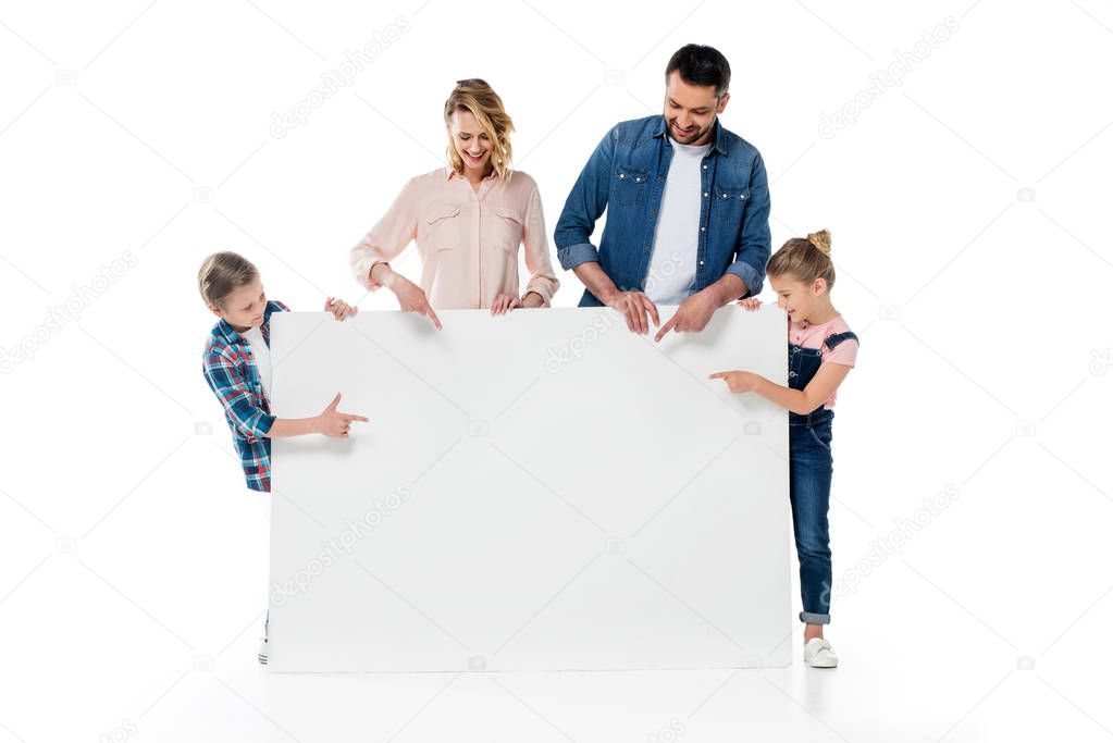 family holding blank banner