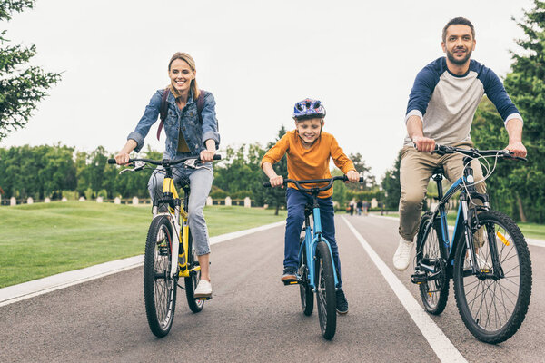 family riding bicycles