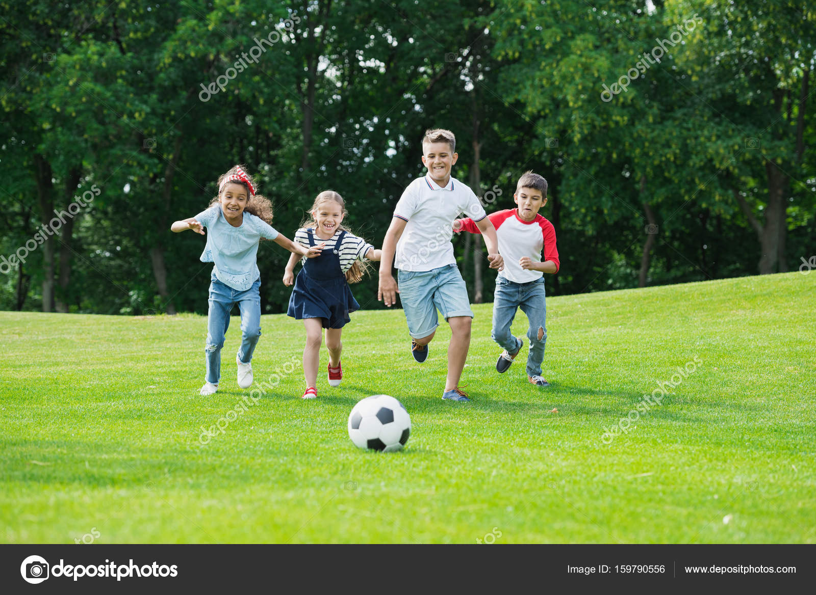 Children playing soccer — Stock Photo © alebloshka #159790556