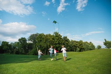 Children playing with kite clipart