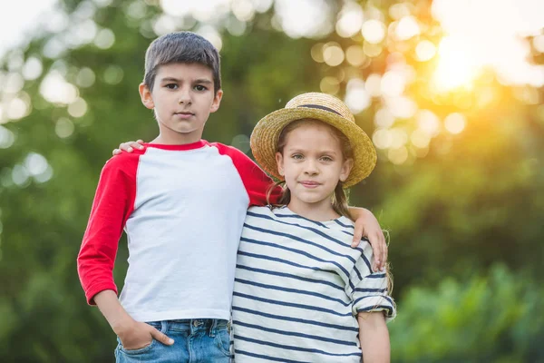 Adorable siblings in park — Stock Photo, Image