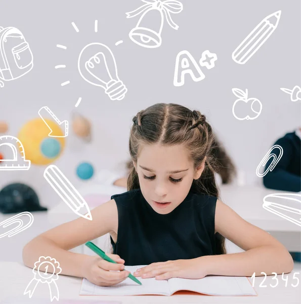 Schoolgirl studying in classroom — Stock Photo, Image