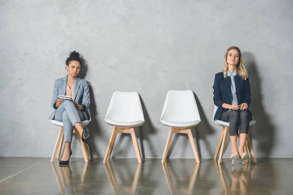 Multicultural businesswomen waiting for interview — Stock Photo, Image