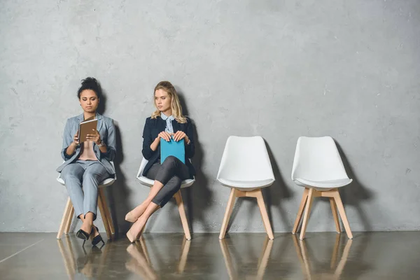 Multicultural businesswomen waiting for interview — Stock Photo, Image