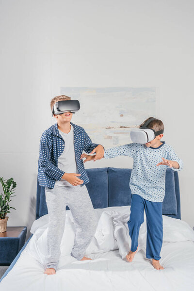 boys in virtual reality headsets