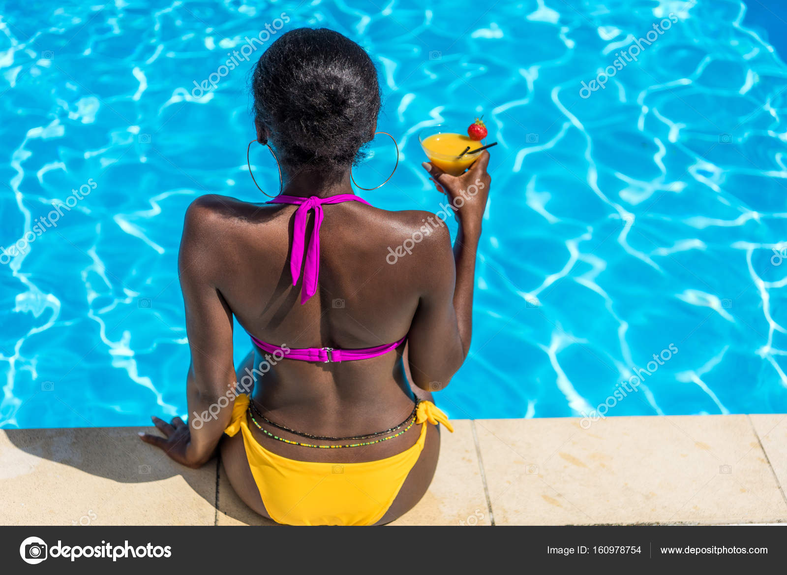 Woman Near Swimming Pool At Resort Stock Photo By Alebloshka 160978754