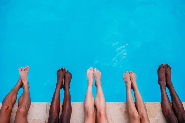 People lying near swimming pool — Stock Image People lying near swimming pool Stock Image