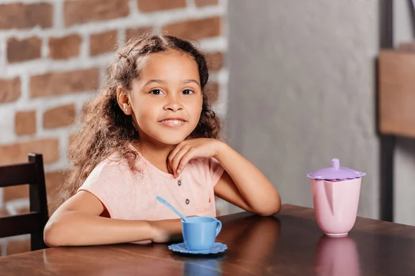 African american girl at tea party — Stock Photo, Image