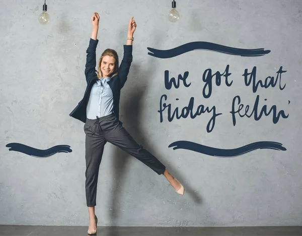 Happy businesswoman in suit — Stock Photo, Image