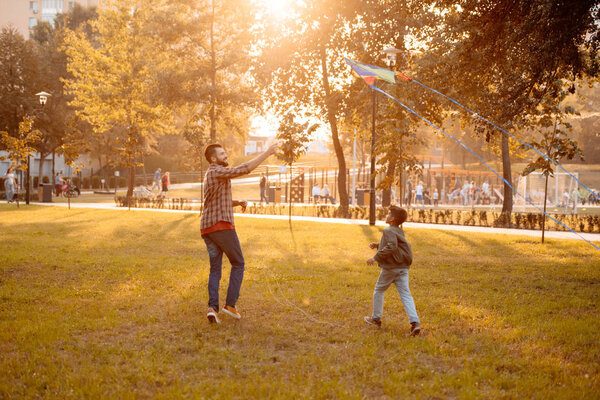 Father and son with kite