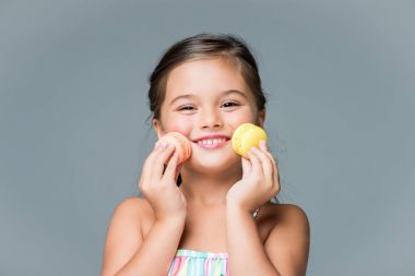 happy child with macaroons clipart