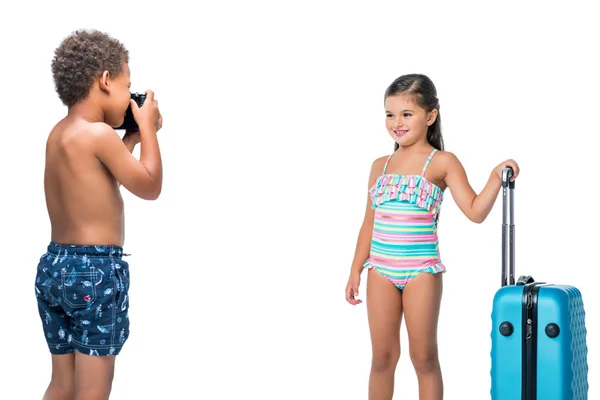 Multiethnic kids with suitcase — Stock Photo, Image