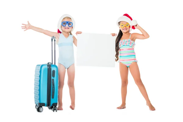 Kids with suitcase and blank banner — Stock Photo, Image