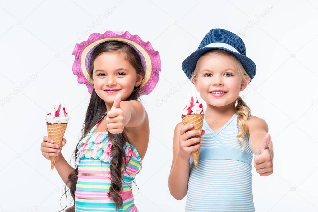 happy kids in swimwear with ice cream