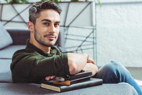 handsome student with books