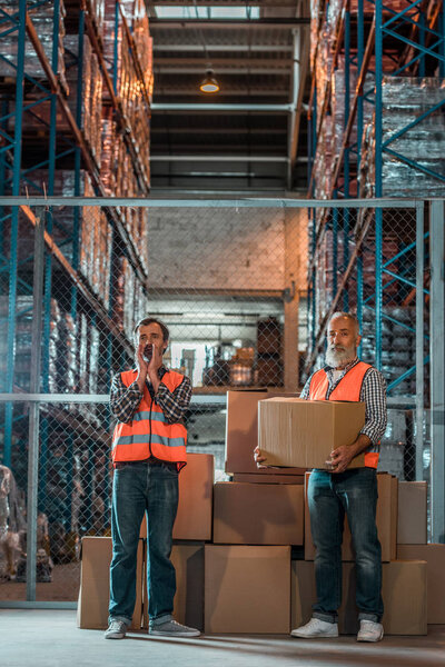 warehouse workers with boxes