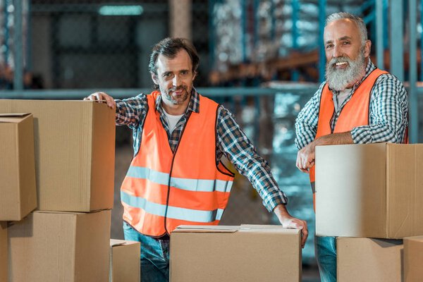 warehouse workers with boxes