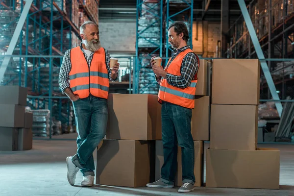 Warehouse workers drinking coffee — Stock Photo, Image