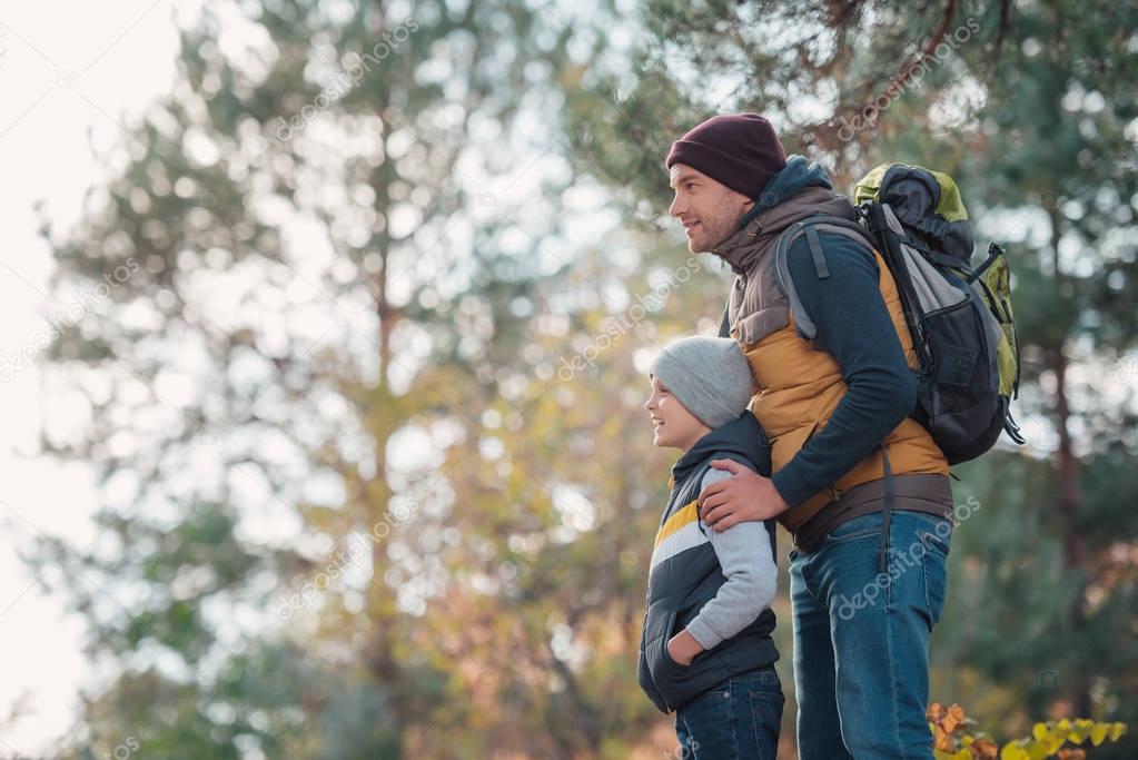 father and son hiking together