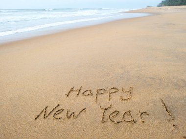 happy new year sign on beach clipart
