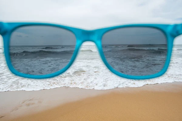 Sea through sunglasses — Stock Photo, Image