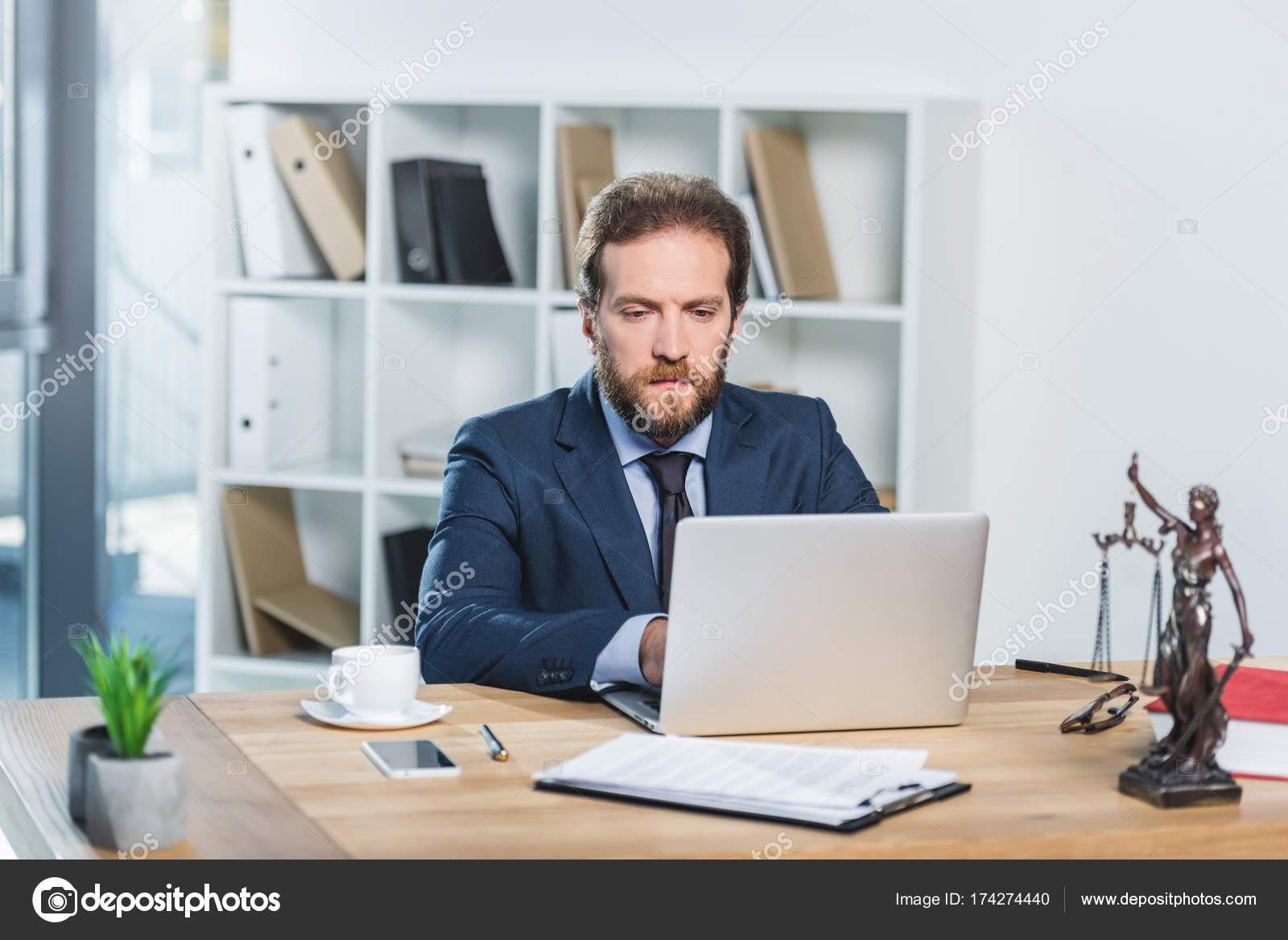 Lawyer working on laptop in office — Stock Photo © alebloshka #174274440