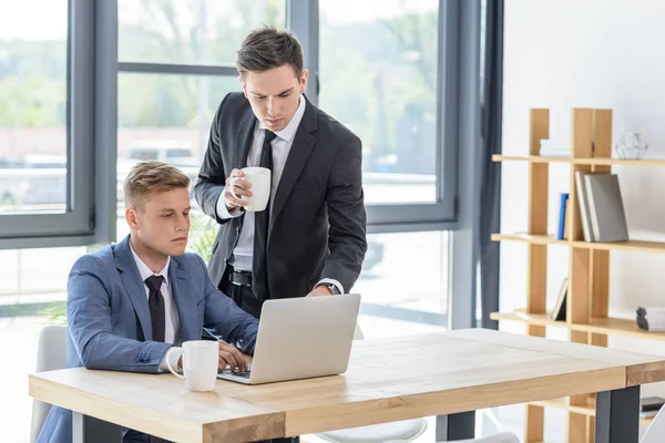 Two Businessmen Discussing Project Laptop Modern Office — Stock Photo, Image