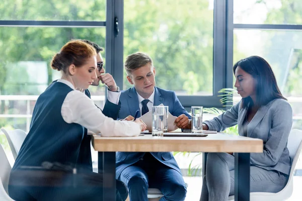 Glass View Thoughtful Businessmen Businesswomen Discussing Project Modern Office — Stock Photo, Image