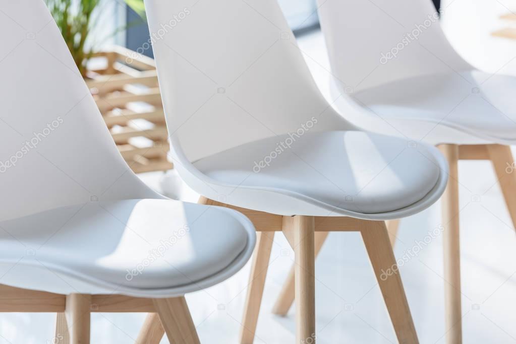 White chairs in light modern office