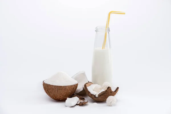 Coconut milk and nut — Stock Photo
