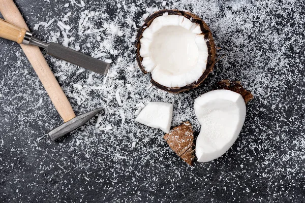 Cracked coconut with shavings — Stock Photo