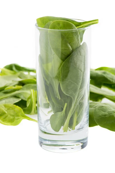 Spinach leaves in glass — Stock Photo